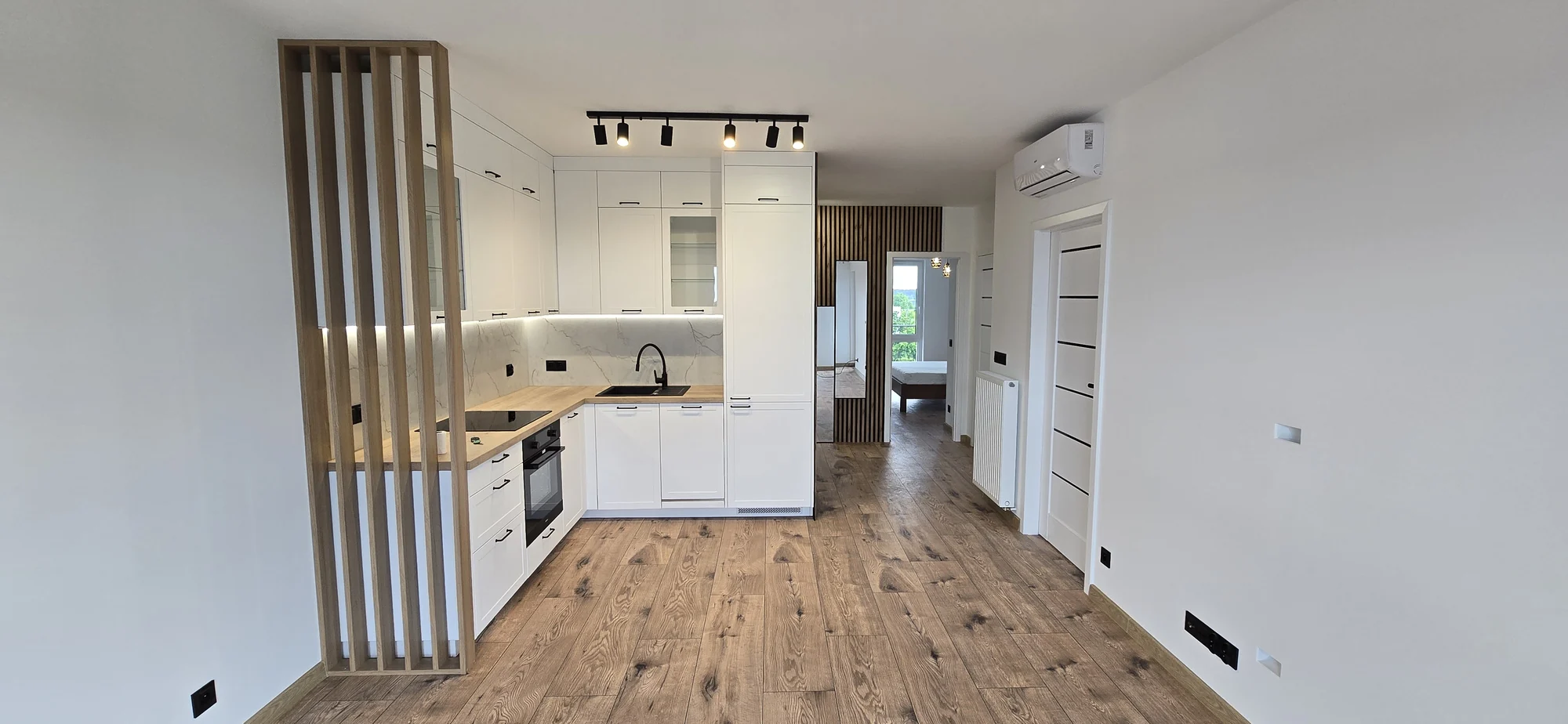 Kuchnia otwarta na część dzienną. Mieszkanie 3-pokojowe 52 m² w Siechnicach